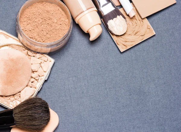 Makeup products to even out skin tone and complexion background