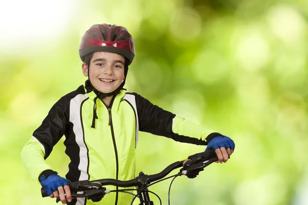 Smiling boy cycling