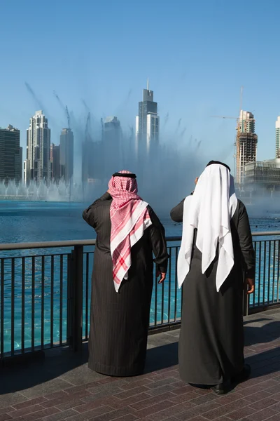DUBAI-FEBRUARY 7:Two sheiks at the Dancing fountains on February