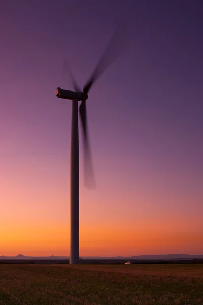 Windfarm at sunset and sky with dust from volcano