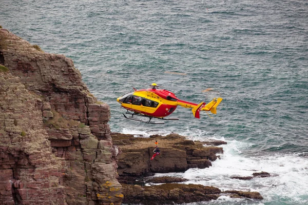 Search and rescue maneuver by Marine Rescue helicopter