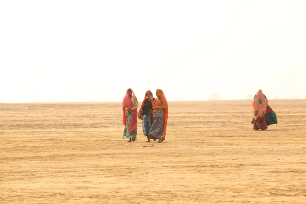 Poor Women in Desert