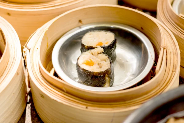 Dim sum in bamboo steamer, chinese cuisine