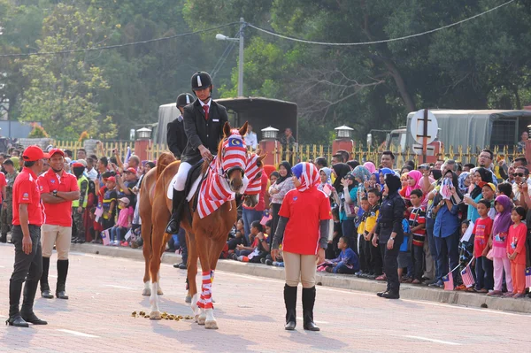 KUANTAN-AUG 31:Malaysians participate in National Day parade, celebrating the 58th anniversary of independence on August 31, 2015 in Kuantan, Pahang, Malaysia.