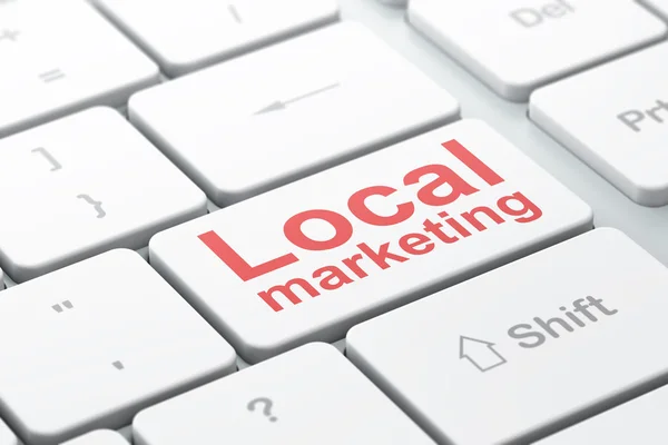 Advertising concept: Local Marketing on computer keyboard background