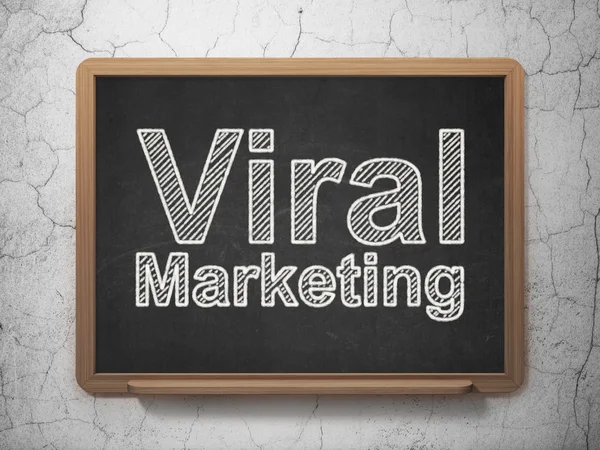 Advertising concept: Viral Marketing on chalkboard background