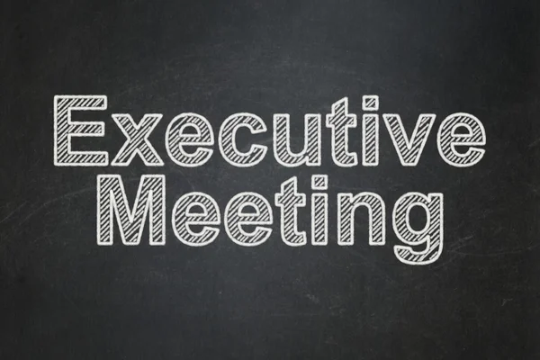 Business concept: Executive Meeting on chalkboard background