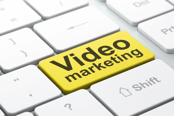 Finance concept: Video Marketing on computer keyboard background