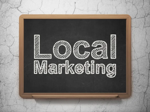 Marketing concept: Local Marketing on chalkboard background