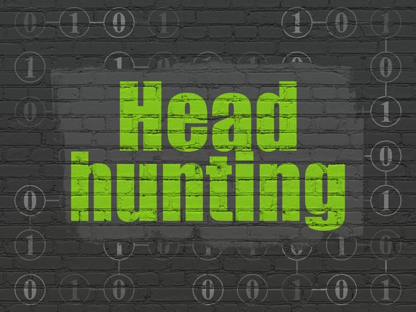 Finance concept: Head Hunting on wall background
