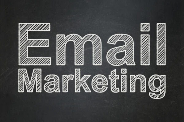 Marketing concept: Email Marketing on chalkboard background