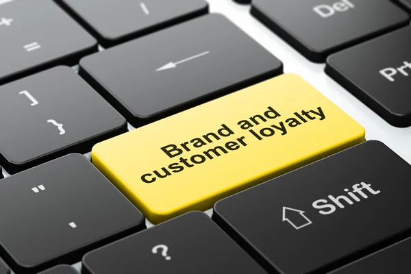 Marketing concept: Brand and Customer loyalty on computer keyboard background