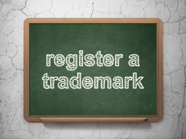 Law concept: Register A Trademark on chalkboard background