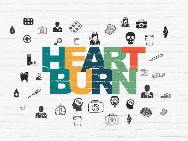 Healthcare concept: Heartburn on wall background