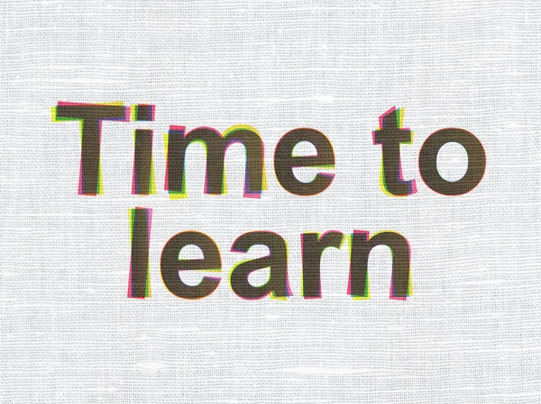 Time concept: Time to Learn on fabric texture background
