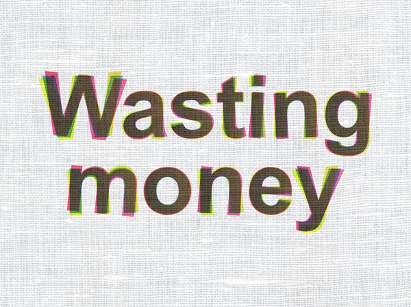 Money concept: Wasting Money on fabric texture background