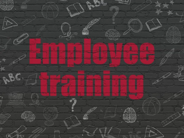 Learning concept: Employee Training on wall background