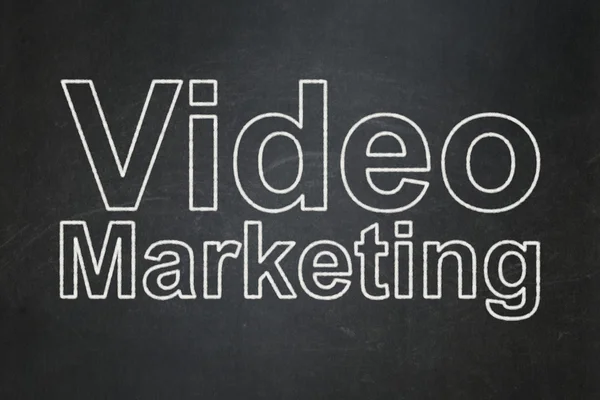 Marketing concept: Video Marketing on chalkboard background