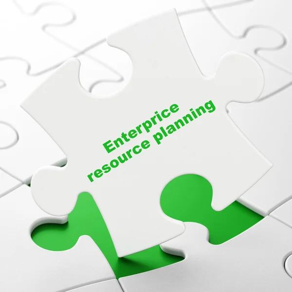 Business concept: Enterprice Resource Planning on puzzle background