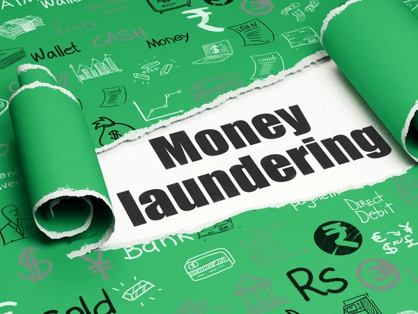 Banking concept: black text Money Laundering under the piece of  torn paper