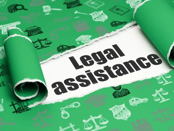 Law concept: black text Legal Assistance under the piece of  torn paper