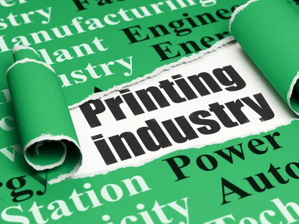 Manufacuring concept: black text Printing Industry under the piece of torn paper