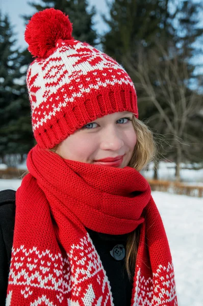 Beautiful blond girl.Traditional   Christmas decorative knitted pattern in Scandinavian style