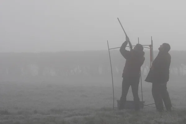 Clay pigeon shooting on a misty day