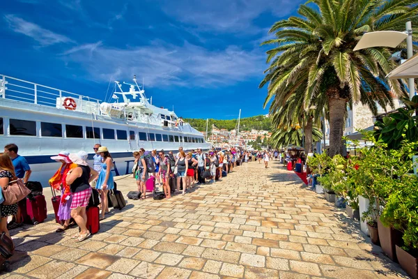 Hvar island harbor tourist queue