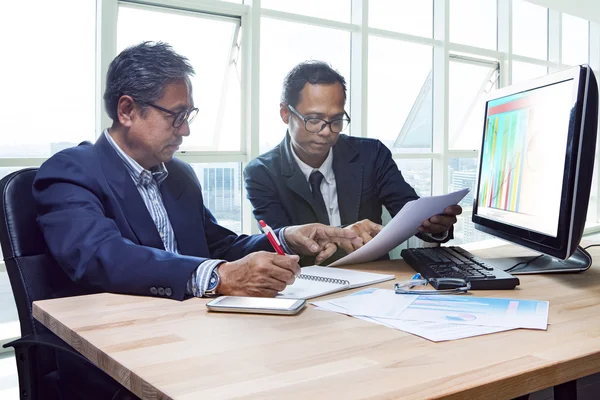 Partner of senior engineering working man serious meeting about