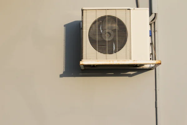 Air condition heating coil handing on building wall with beautif
