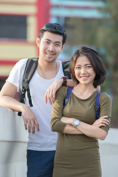 Couples of younger asian man and woman relaxing with happy face on vacation trip
