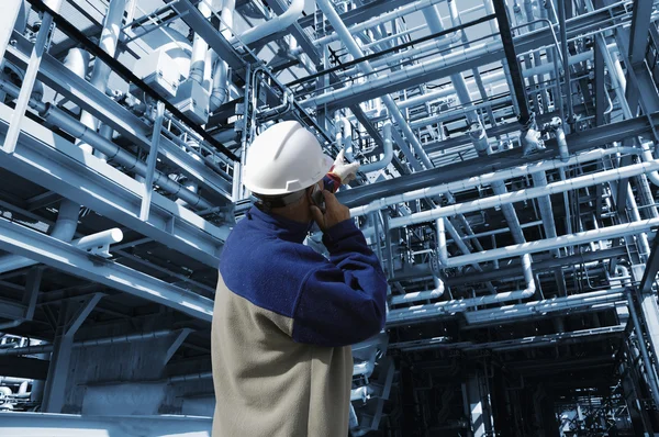Oil and gas worker inside pipelines constructions