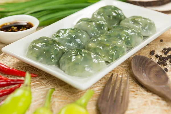 Steamed Dumpling stuffed with Garlic Chives and Taro and bamboo