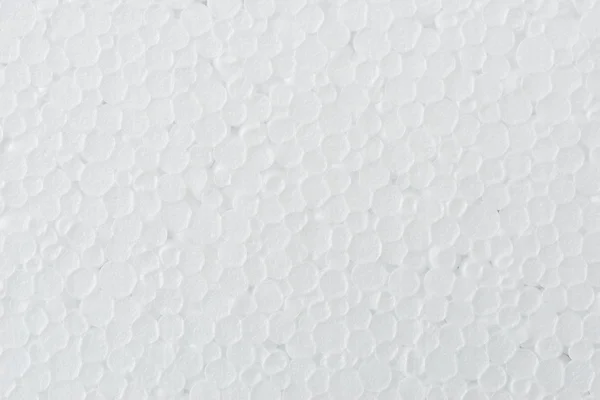 Background of white foamed polystyrene surface