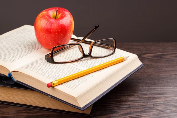 Red apple and book