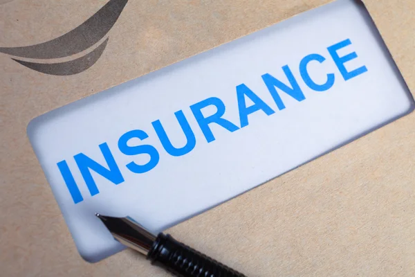 Insurance Claim form in brown envelope, can use insurance concep