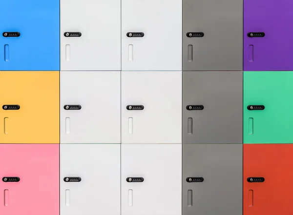 Row of colorful lockers and security password code on door for s