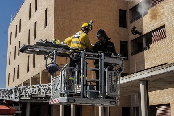 Firefighters working in rescuing injured in a building in Talavera de la Reina, Toledo, Spain