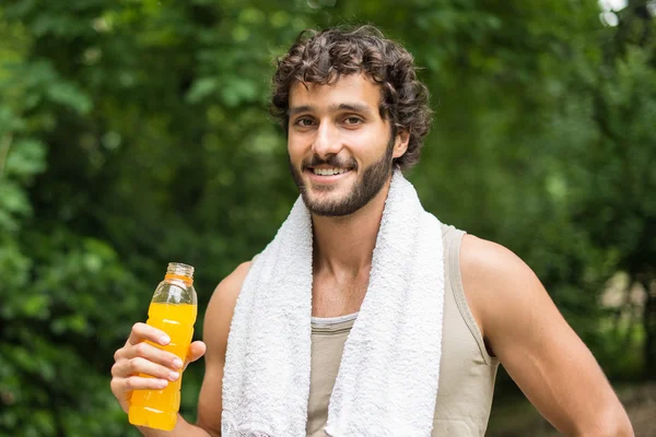 Man ready to drink after sport