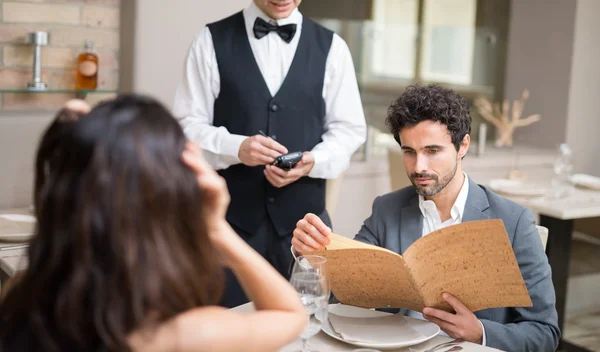 Couple having dinner in restaurant