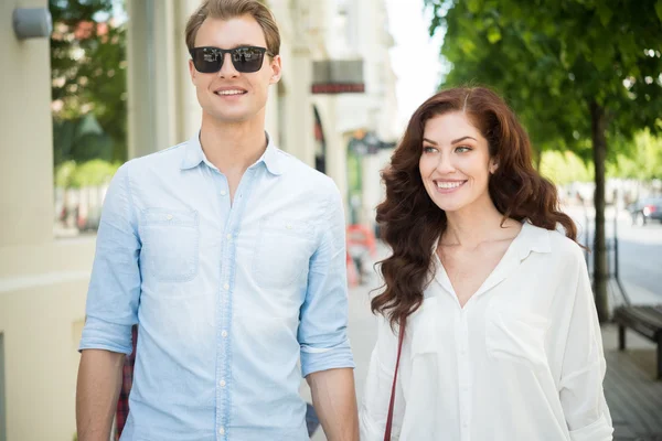 Couple walking in city