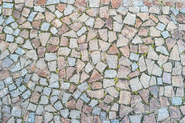 Uneven stone tiles background