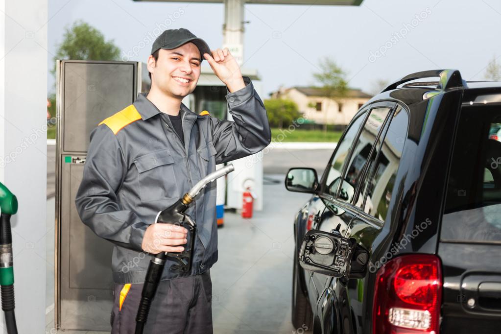 Gas Station Attendant At Work Stock Photo Minervastock 54313477 gas-station-attendant-at-work-stock-photo-minervastock-54313477