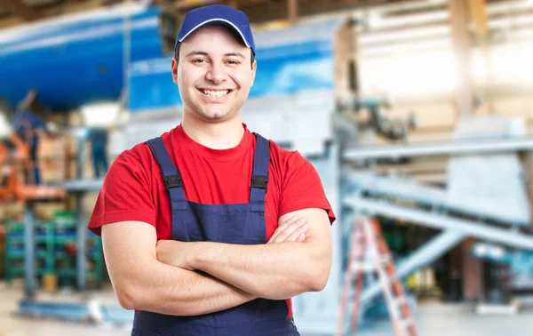 Friendly smiling mechanic