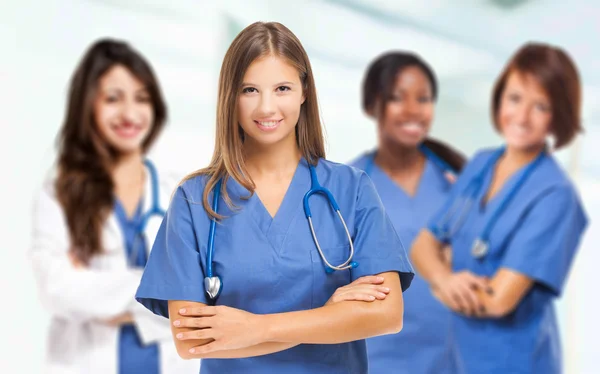 Nurse in front of medical team