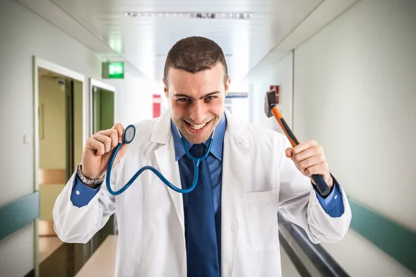 Doctor holding an hammer