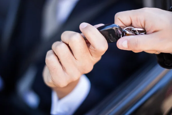 Man taking car key