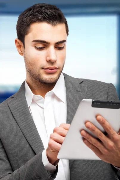 Businessman using tablet pc