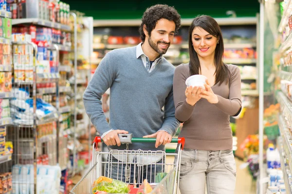 Couple shopping in supermarket